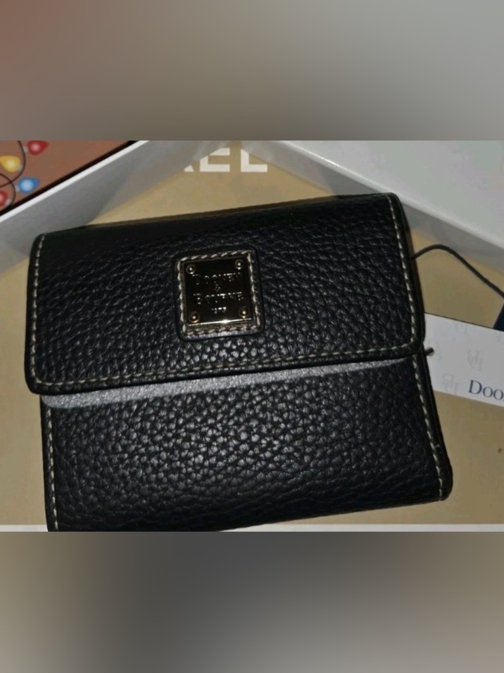 Dooney & Bourke Black Pebbled Leather Wallet with Metal Logo Plaque